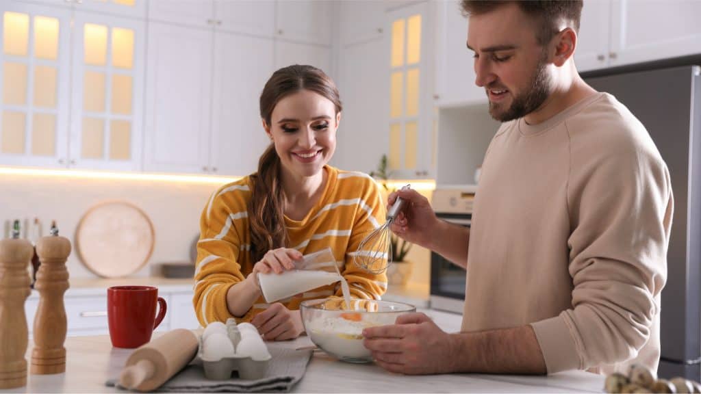 couple cooking at home as an at home date idea