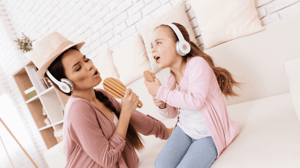 mom singing with daughter to relieve burnout
