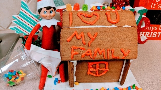 Elf on the Shelf made a gingerbread house