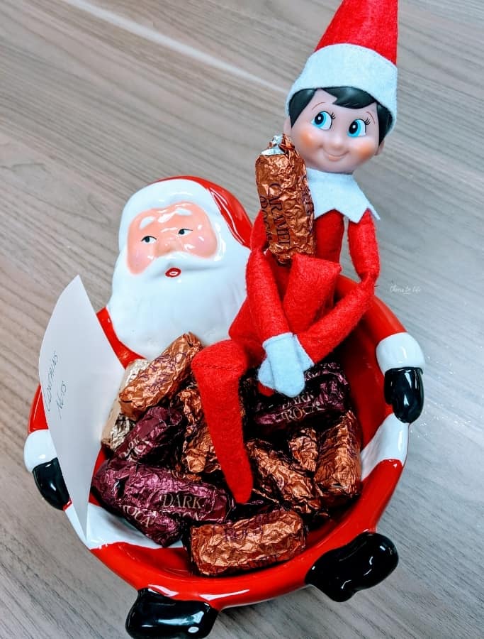 elf on the shelf hiding in the chocolate bowl