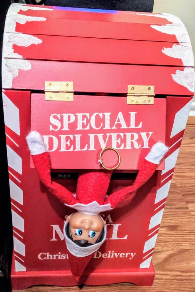 Elf on the shelf hiding in Santa mailbox 
